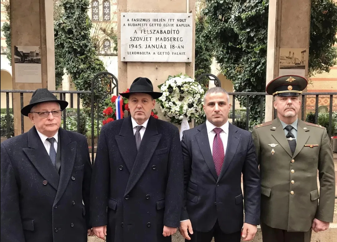 Colonel Oleg Smirnov (in the green military uniform on the far right)